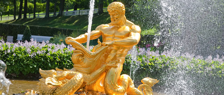 Guilded statue in the Grand Palace of Peterhof in St. Petersburg. 